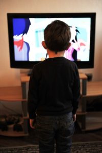 child behind tv 200x300 Speech Development In Toddlers